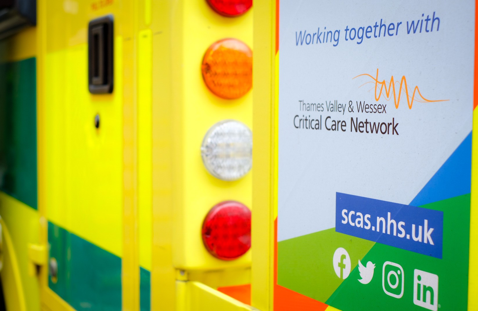 Ambulance with Thames Valley and Wessex Adult Critical Care Network logo